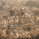 Search and rescue vehicles from the Jackson County Sheriff’s Office are seen in a mobile home park that was destroyed by wildfire in Ashland, Oregon.